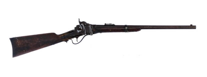 Sharps New Model 1863 Carbine .52 Rifle: Description Sharps New Model 1863 Carbine chambered in .52 caliber with a single round capacity and a 22" barrel. Serial number C24035.m Patinated blued finish. Falling block action with functional ha