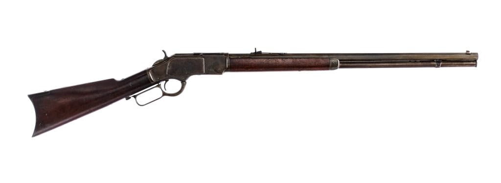 Antique Winchester 1873 .22L Lever Action Rifle: Description Winchester 1873 chambered in .22 long with a tubular magazine and a 24" Kings Improvement octagonal barrel. Manufactured in 1889 with serial number 290617B. Patinated blued and case colore