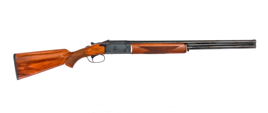 Valmet 412 12 Ga Over/Under Shotgun: Description Finnish made Valmet model 412 chambered in 12 gauge for 2 3/4" shells with 26" over/under double barrels. Fixed MOD chokes. Glossy blued barrels, lock, and trigger guard. Blued lever and s