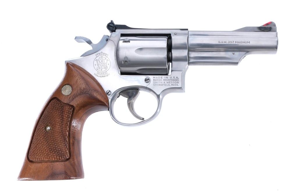 Smith & Wesson 66 .357 Magnum Revolver: Description Smith & Wesson model 66 chambered in .357 Magnum with a 4" ported barrel. Stainless steel barrel, frame, fluted cylinder, and checkered cylinder release. Case colored double action trigger