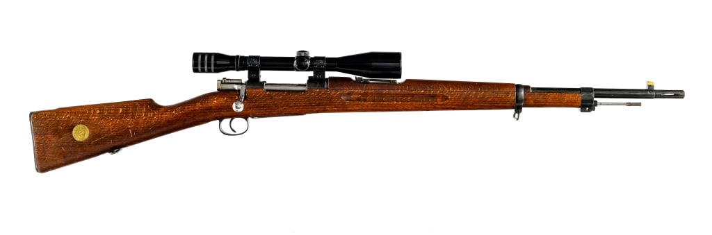 Husqvarna M38 6.5x55mm Bolt Action Rifle: Description Swedish Husqvarna Model 1938 chambered in 6.5x55mm with a five round capacity and a 24" barrel with mounted flash hider. Imported by SAMCO, marked on the barrel. Front cleaning rod and bay