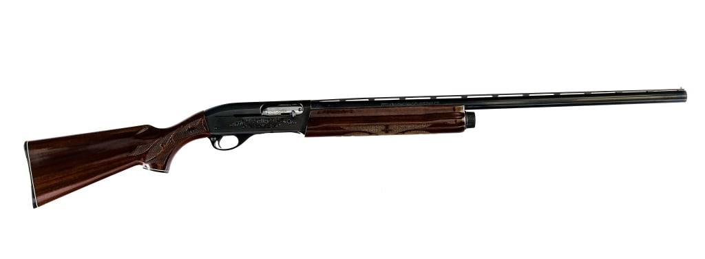 Remington 1100 12 Ga Semi Auto Shotgun: Description Remington 1100 chambered in 12 gauge for 2 3/4" shells with a tube magazine and a 28" vented rib barrel. Manufactured in 1985 with RF date code. The bore has a removable MOD choke. Blued b