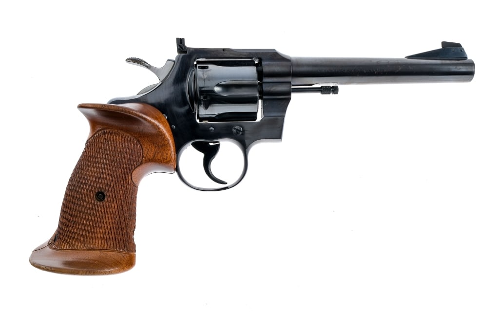 Colt Officers Model Match .22 LR Revolver: Description Colt Officers Model Match chambered in .22 long rifle with a six-shot cylinder and a 6" barrel. Manufactured in 1955 with serial number 69886. Blued barrel, frame, fluted cylinder, double
