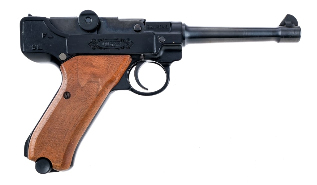 Stoeger Luger .22 LR Semi Auto Pistol: Description Stoeger Luger chambered in .22 long rifle with one, ten round removable magazine and a 5.5" barrel. Black alloy frame with smooth wood grips. Push button magazine release and manual thumb 