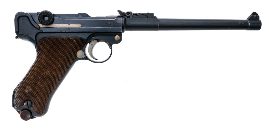 Matching DWM 1914 Artillery Luger 9mm Pistol: Description DWM 1914 Pattern Artillery Luger chambered in 9mm with one, matching magazine and a 8" barrel. The magazine is tin plated with a wood base. Manufactured in 1917 with serial number 896. Rus