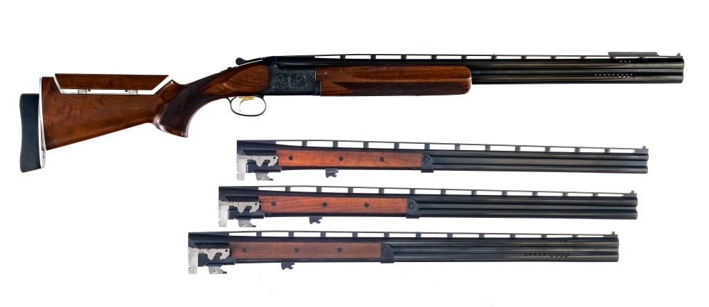 Browning Citori 4 Barrel Set O/U Shotgun: Description Browning Citori in 12 gauge 2 3/4" with a two round capacity and a 28" Invector Plus ported over under top rib vented barrel. Includes three extra 28" top rib vented barrels in assorted ga