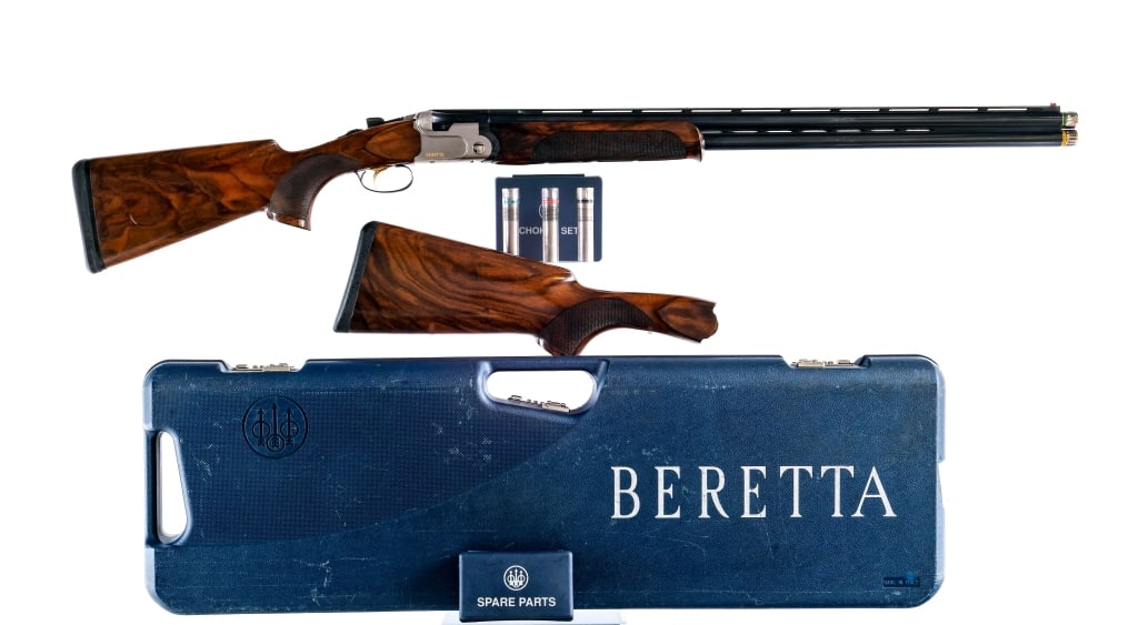 Beretta DT10 Trident 12 Ga O/U Shotgun: Description UPDATE: Stock on the gun is a left handed, with left hand swell and the extra stock is right handed with a right hand swell. Right hand stock has neutral Cast and the left handed is Cast O