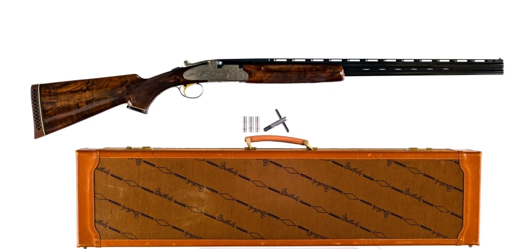 Weatherby Athena Skeet .410 Over Under Shotgun: Description Weatherby Athena chambered in .410 bore for 3" shells with 28" vented rib over/under barrels. The top and bottom bore have removable SK I chokes. Also includes removable Mod, IM, and Full