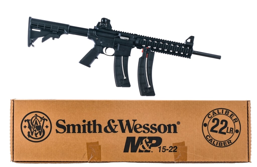 Smith & Wesson M&P 15-22 .22 LR Semi Auto Rifle: Description Smith & Wesson M&P 15-22 chambered in .22 Long Rifle with two magazines and a 16" barrel. 10" Polymer quad picatinny rail handguard. Flat top upper receiver with picatinny optics rail and