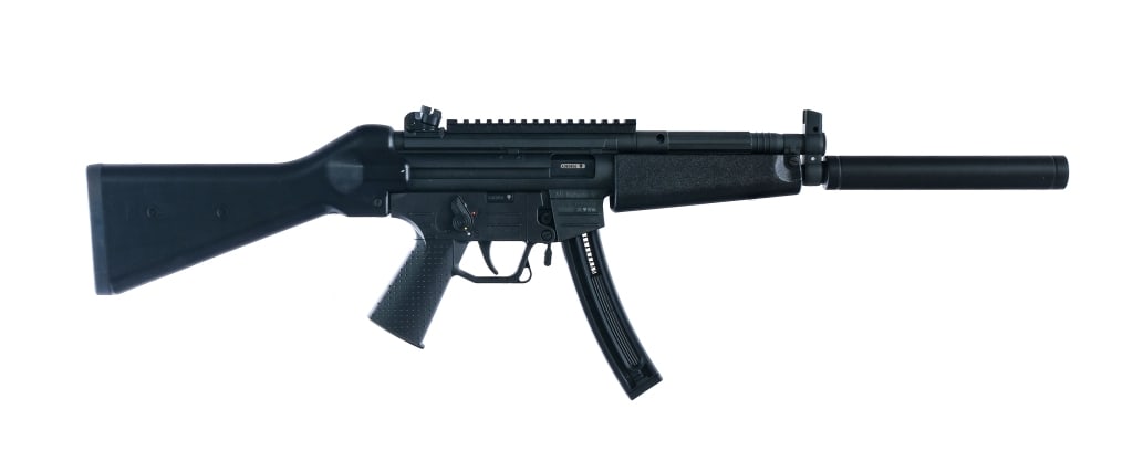 German Sport Guns GSG-522 .22 LR Semi Auto Rifle: Description German Sport Guns GSG-522 chambered in .22 long rifle with one, ten round magazine and a 16.25" 16" barrel with a faux suppressor. Black polymer wide front handguard. Serrated cocking hand