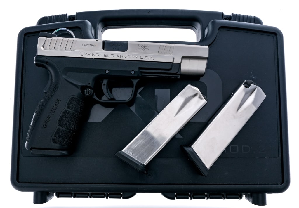 Springfield Armory XD-9 Tactical Mod 2 9mm Pistol: Description Springfield Armory Model XD-9 Tactical Mod 2 in 9mm with three, sixteen round removable magazines and a 5" barrel. Textured black composite grip on frame. Blued trigger and barrel. Serrate