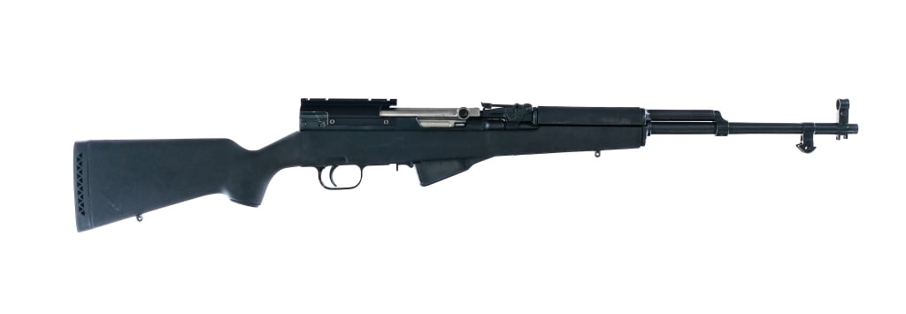 Russian Sporterized SKS 7.62x39mm Semi Auto Rifle: Description Russian SKS ( Sporterized ) chambered in 7.62x39mm with a ten round internal magazine and a 20.5" barrel. Imported by C.D.I. marked on the right side of rear receiver. Rubber butt pad. Smo