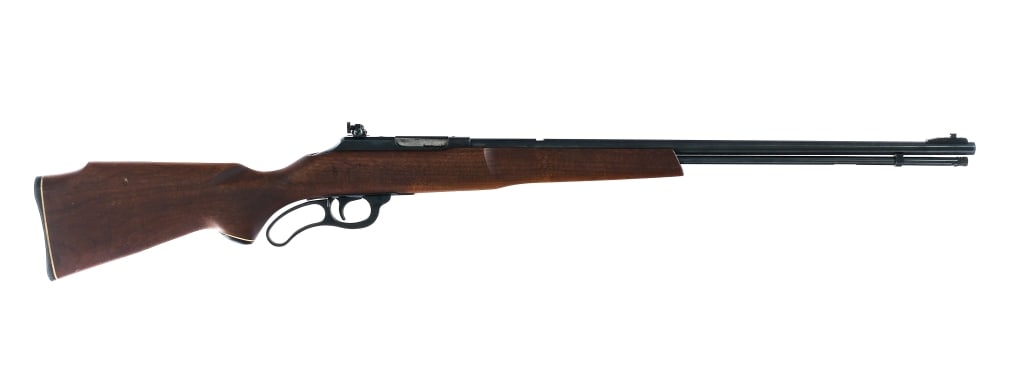 Marlin 57-M .22 Mag Lever Action Rifle: Description Marlin Model 57-M in .22 Magnum with a fourteen round capacity and a 23" barrel. Checkered composite butt plate. Smooth wood stock. Blued hand lever, trigger, receiver, magazine tube and b