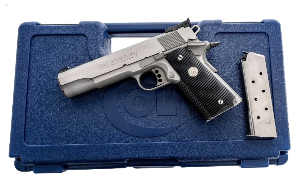 Colt Gold Cup Trophy .45 ACP 1911: Colt Gold Cup Trophy chambered in .45 ACP with two, eight round removable Colt magazines and a 5" NM barrel. Manufactured in 2011 with serial number GCT29410. Stainless steel frame with checkered rubb