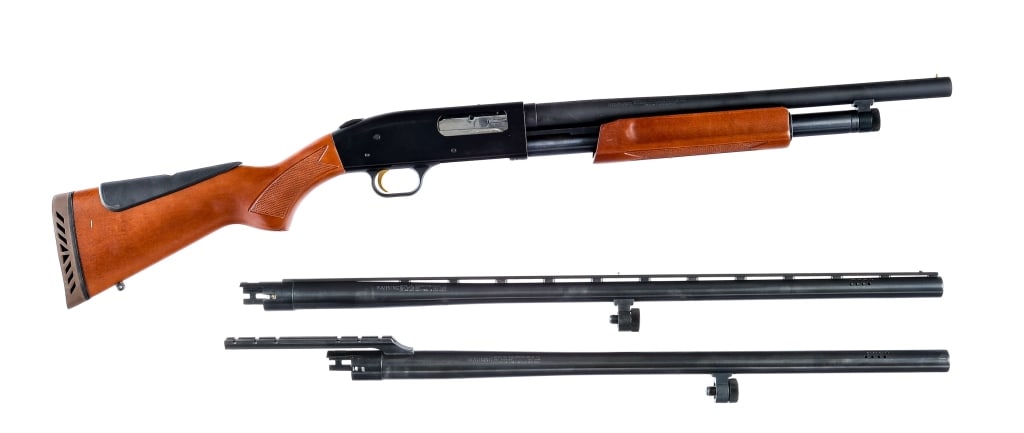 Mossberg 500 12 Gauge Pump Shotgun, 3 Barrels: Mossberg 500 chambered in 12 gauge for 2 3/4" and 3" shells, with a tubular magazine and three barrels. The currently installed barrel is a parkerized 18.5" barrel, with a fixed cylinder choke. The se