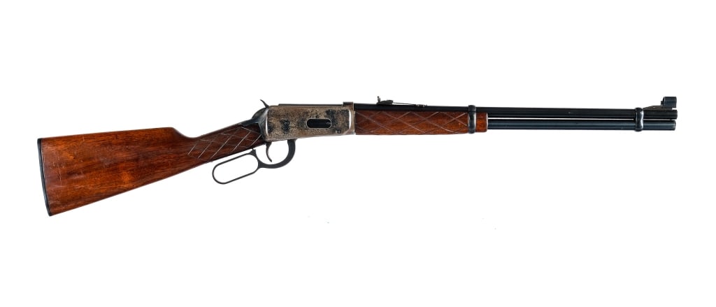 1965 Winchester 94 .30-30 Win Lever Action Rifle: Winchester 94 chambered in .30-30 Winchester with a six round tube magazine and a 20" barrel. Manufactured in 1965 with serial number 2829453. Blued barrel, magazine tube, receiver, hammer, lever, and