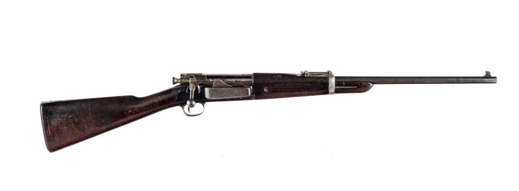 U.S. Springfield 1895 .30-40 Krag Bolt Rifle: U.S. Springfield 1895 Krag Carbine in .30-40 Krag with a five round internal capacity and a 22" barrel. Metal butt plate with cleaning rod door (Empty). Solid wood stock and foregrip. Finish worn blue