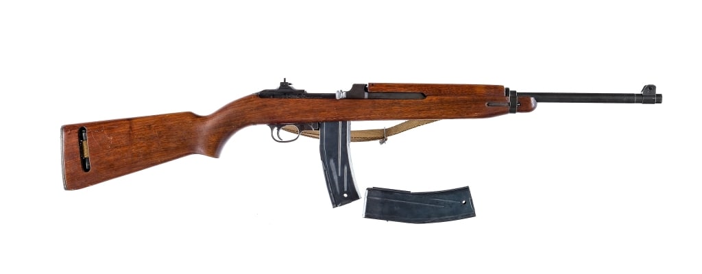 Inland M1 Carbine .30 Carbine Semi Auto Rifle: Inland M1 Carbine chambered in .30 Carbine with two, thirty round magazines and a 18" barrel. Manufactured in 1943 with serial number 981446. Inland/General Motors barrel dated 10-43. Type 1 barrel ba