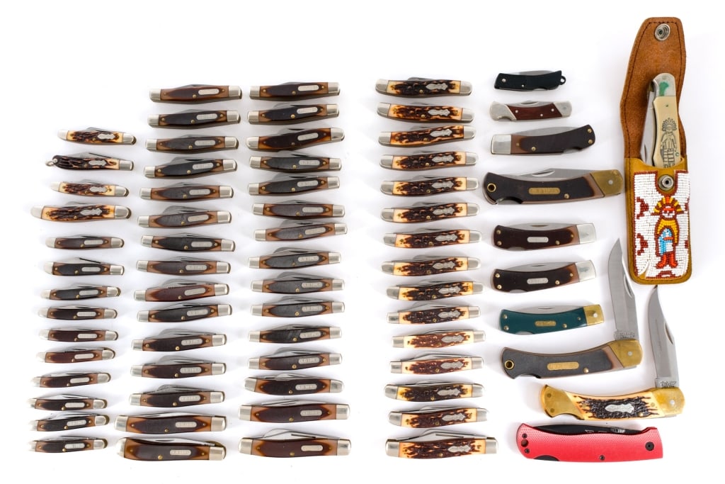Schrade USA Folding Knives 70 Pcs Lot Knife: This lot is for seventy Schrade USA folding knives. Some of the models include, Old Timer, X-Timer, Uncle Henry and Ducks Unlimited. One Schrade Scrimshaw Kachina folding knife in beaded leather belt
