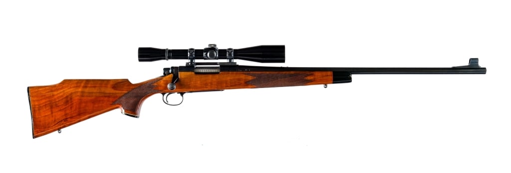 Remington 700 .22-250 Rem Bolt Action Rifle: Remington 700 in .22-250 Remington with a five round capacity and a 24" barrel. Made in Ilion New York in 1974. Checkered Monte Carlo style wood stock and front forend. Blued receiver and barrel. Jewe