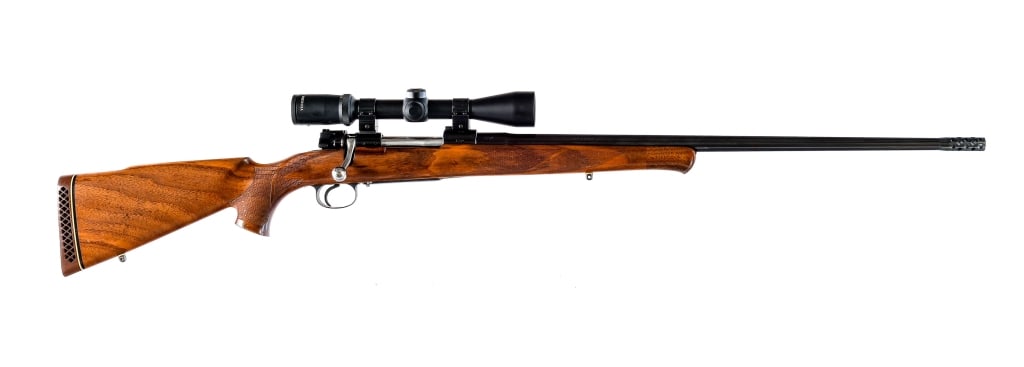 Custom FN Mauser .308 Norma Mag Bolt Action Rifle: FN Mauser chambered in .308 Norma Magnum with a internal magazine and a 26" barrel including the muzzle break. This rifle was rechambered from .30-06 to .308 Norma Mag. Imported by Firearms Internatio