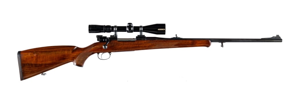 CZ VZ 24 Mod 98 .30-06 Bolt Action Rifle: CZ VZ 24 Model 98 in .30-06 with a five round capacity and a 24" barrel. Checkered Monte Carlo style wood stock. Blued receiver and barrel. Rear bolt safety. Mid barrel adjustable notch and front fixe