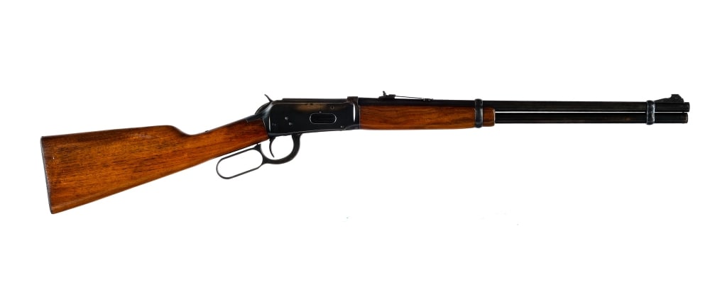 Winchester 94 .30-30 Win 1964 Lever Action Rifle: Winchester 94 in .30-30 with a seven round capacity and a 20" barrel. Made in New Haven Connecticut in 1964. Smooth wood stock and front forend. Blued hand lever, receiver, magazine tube and barrel. R
