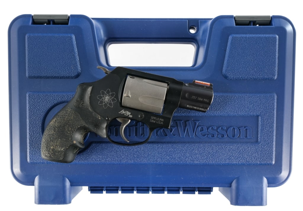 Smith & Wesson AirLite 360PD .357 Mag Revolver: Smith & Wesson Airlite 360PD chambered in .357 magnum with a five-shot cylinder and a 1.875" stainless steel barrel. Lightweight scandium allow frame with black finish. Matte finished titanium alloy c