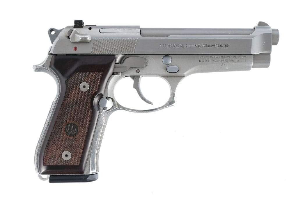 Beretta 92FS 9mm Semi Auto Pistol: Beretta 92 FS in 9mm with one, ten round removable magazine and a 5" barrel. Stainless steel frame with ribbed front strap, backstrap, and checkered wood grips with thumb rest. Double/single action tr