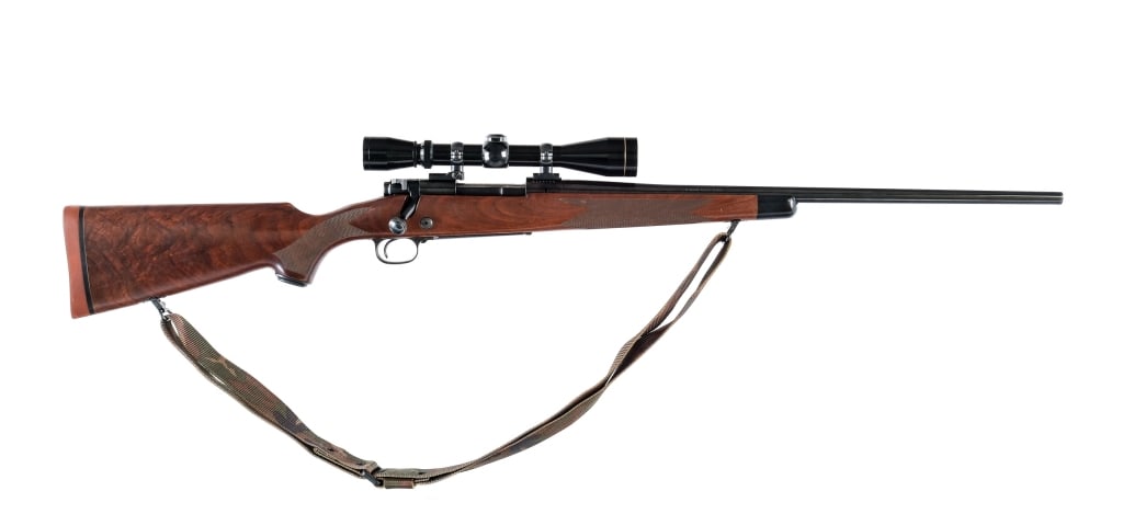 Winchester 70 Super Grade .30-06 Sprg 1969 Rifle: Winchester 70 Classic Super Grade in .30-06 Springfield with a five round capacity and a 24" barrel. Floorplate marked "Super Grade". Made in New Haven Connecticut in 1969. Checkered Monte Carlo style