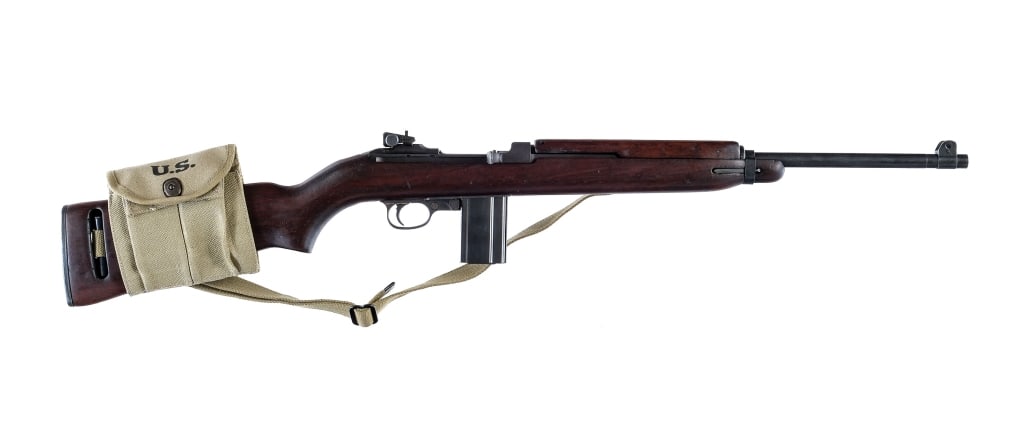 Winchester M1 Carbine .30 Carbine Semi Auto Rifle: World War II Winchester M1 Carbine chambered in .30 Carbine with one, fifteen round magazine and an 18" barrel. "W" is stamped on the barrel. Type 1 barrel band. Adjustable rear peep sight and fixed f