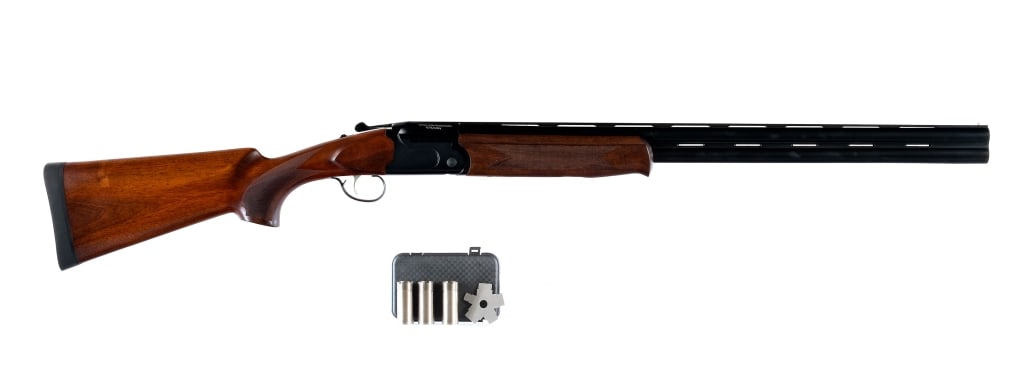 Stevens Savage 555 12 Ga O/U Shotgun: Stevens/Savage Arms Model 555 in 12 gauge 2 3/4"-3" with a two round capacity and a 28" over under top rib vented barrel. Top bore has a IMP MOD removable choke and the bottom a IMP CYL removable chok