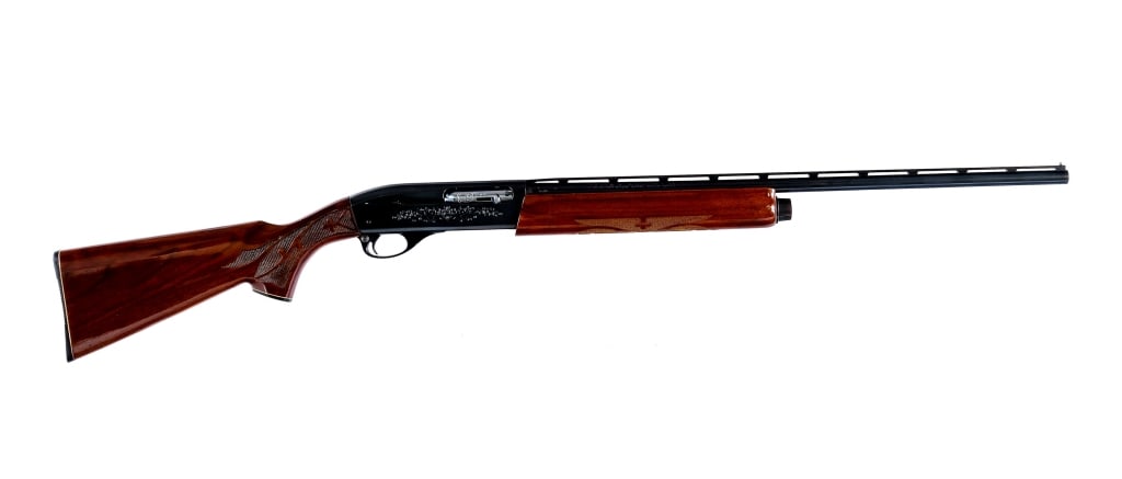 Remington 1100LW 28Ga Semi Auto Shotgun: Remington 1100LW chambered in 28 Gauge for 2 3/4" shells with a three round tube magazine and a 25" vented rib barrel. Fixed MOD choke. Silver bead front sight. Cross bolt safety. Blued finish with ch