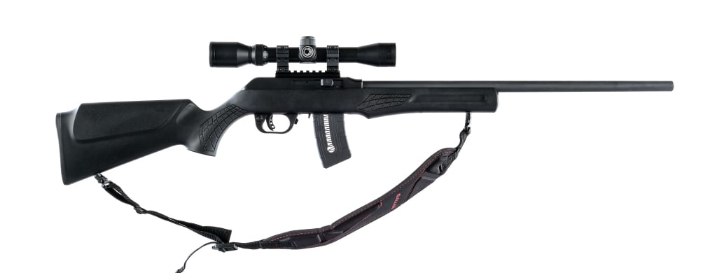Rossi RS22M .22 Mag Semi Auto Rifle: Rossi RS22M chambered in .22 magnum with one, ten round magazine and a 21" barrel. Picatinny rail with mounted Barska 3-9x32 scope. Cross bolt safety. Matte black finish with textured polymer pistol g