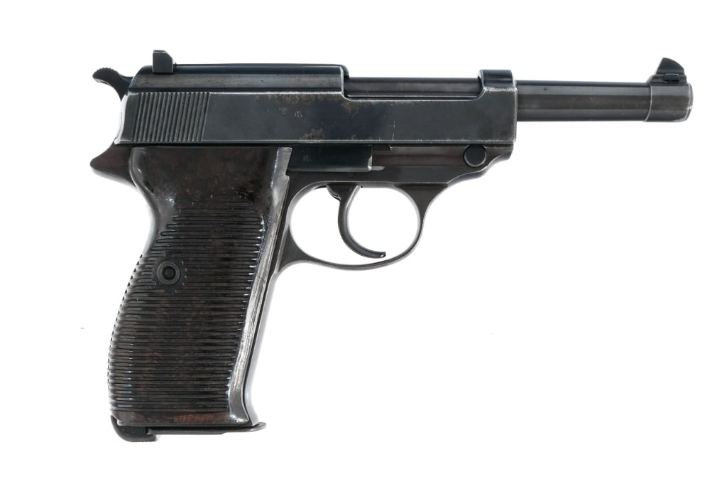 WW2 Walther AC P38 9mm Semi Auto Pistol: World War Two Third Reich Era Walther AC Code P38 chambered in 9mm with one, eight round serial number matching magazine and a 4.9" barrel. Manufactured in July 1941 with serial number 2795e. Blued st