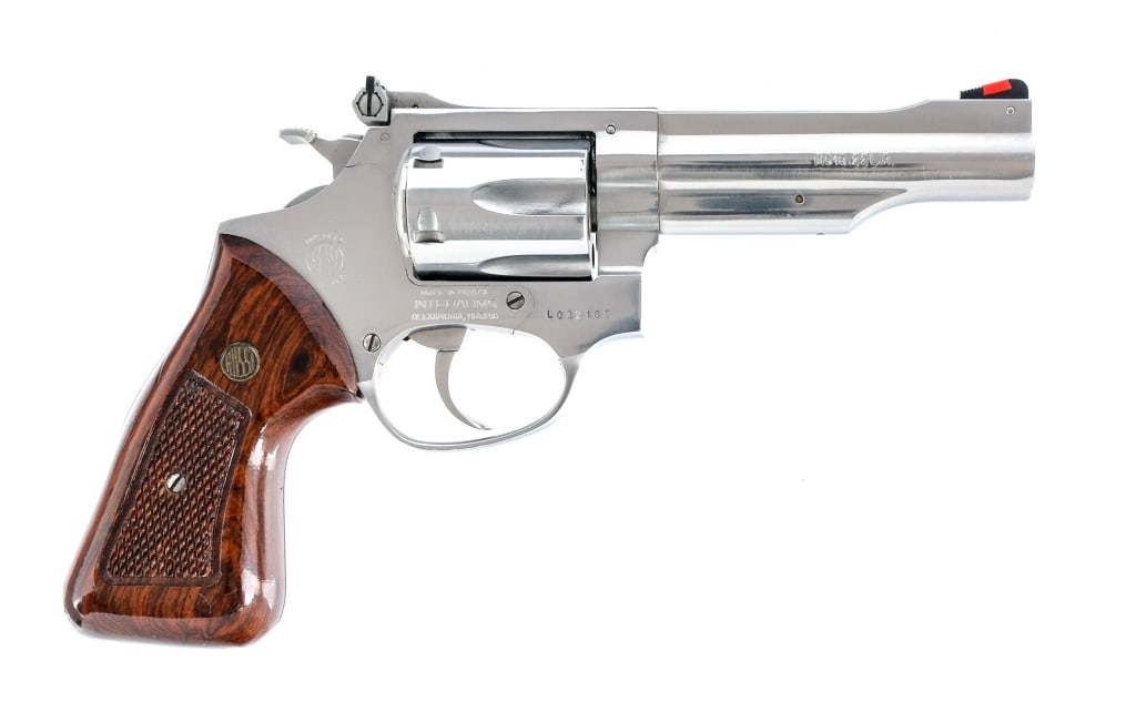 Rossi M518 .22 Long Rifle Revolver: Rossi M518 chambered in .22 long rifle with a six-shot cylinder and a 4" barrel. Manufactured in Brazil, imported by Interarms. Stainless steel finish with checkered wood grips. Adjustable rear sight