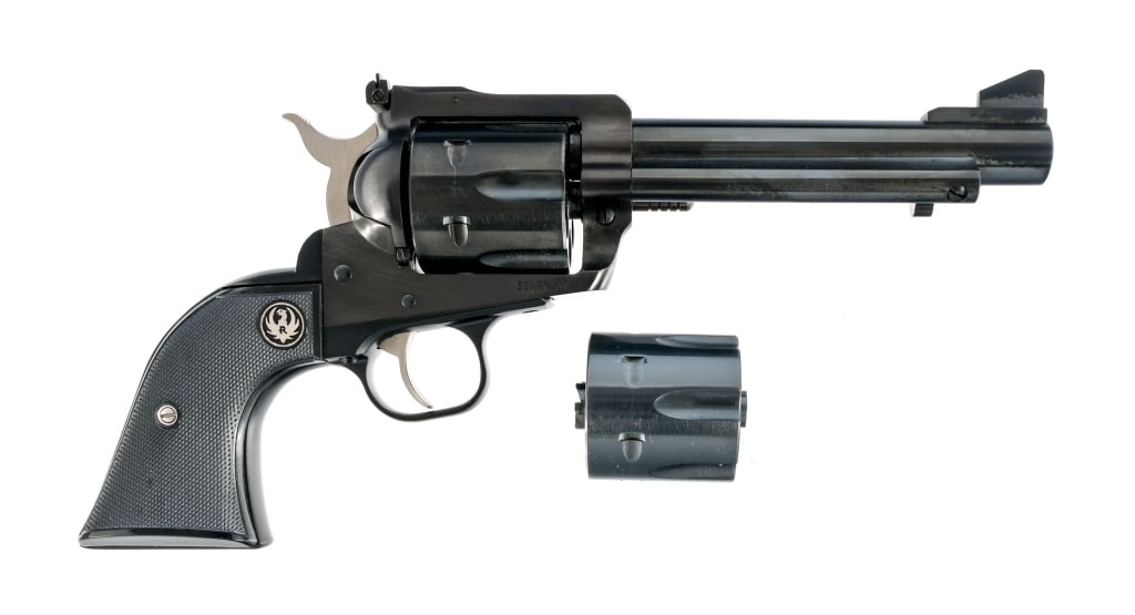 Ruger New Model Blackhawk .45 LC/ACP Revolver: Ruger New Model Blackhawk Convertible in .45 Long Colt with a six round capacity and a 5.5" barrel. Includes a extra .45 ACP six round cylinder. Checkered composite grip plates. Blued trigger guard, f