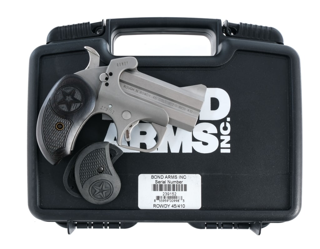 Bond Arms Rowdy .45 Colt/.410 Bore Derringer: Bond Arms Rowdy chambered in .45 Colt and .410 bore for 2.5" shells, with a two-shot capacity and 3" Rough N Rowdy double barrels. Matte stainless steel frame with checkered wood grips. Single action