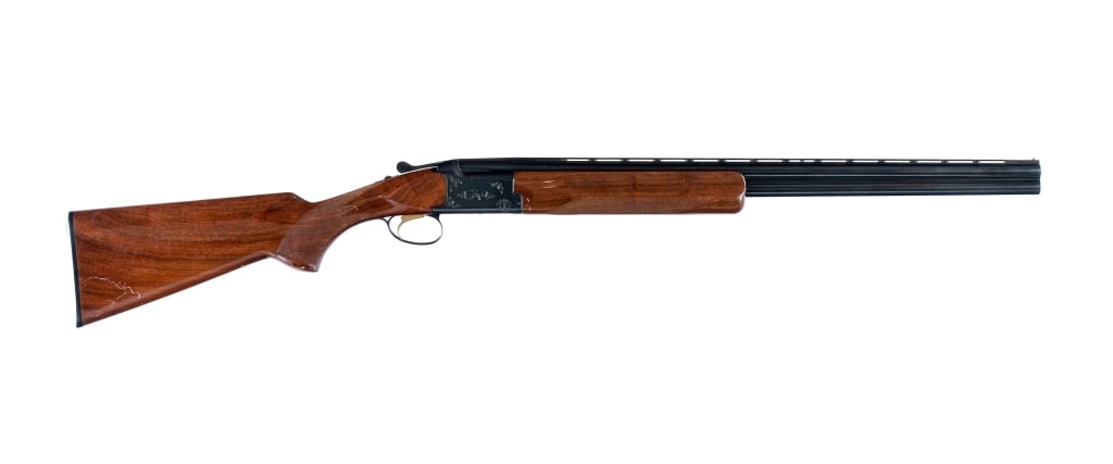 Browning Citori 20 Ga O/U Shotgun: Browning Citori in 20 gauge for 2 3/4" and 3" shells with a two round capacity and a 26" vented rib over/under barrel. Top barrel has a FULL and the bottom a MOD fixed choke. Made in Japan in 1982. Ch