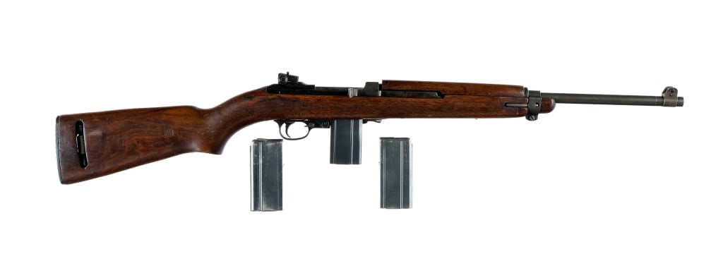 National Ordnance M1 Carbine .30 Carbine Rifle: National Ordnance M1 Carbine chambered in .30 Carbine with three, fifteen round magazines and a 18" barrel. Adjustable rear sight and fixed front blade. Type 2 barrel band. Round bolt body. The top of
