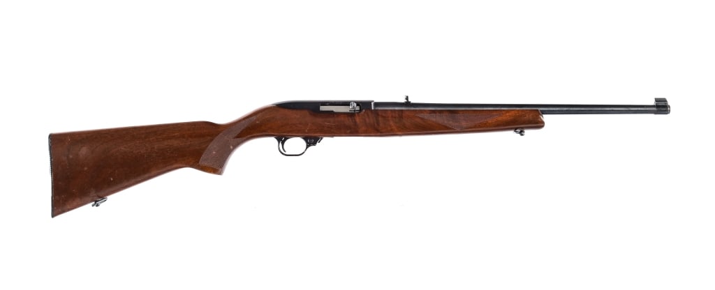 Ruger 10/22 Carbine .22 LR Semi Auto Rifle: Ruger 10/22 Carbine chambered in .22 long rifle with a 18" barrel. Manufactured between 1984 and 1985 with serial number 125-38790. Adjustable rear sight and fixed front blade. Drilled and tapped allo