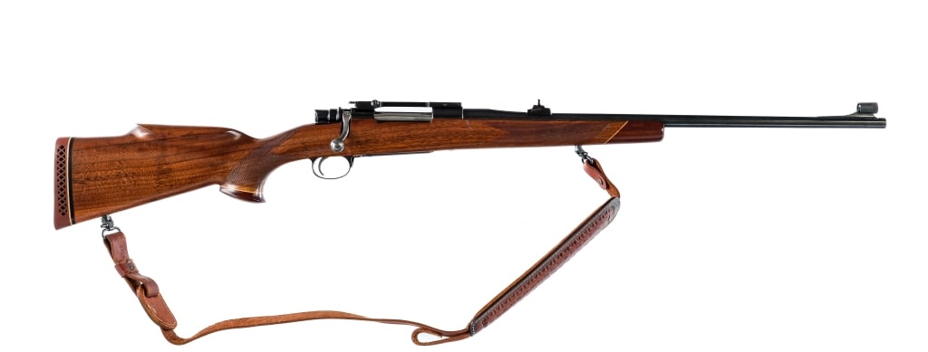 Flaig's FN Commercial Mauser .30-06 Rifle: Flaig's Custom FN Commercial Mauser chambered in .30-06 Springfield with a five round capacity and a 24" Flaig's barrel. Adjustable rear Williams sight and hooded front blade sight. FN action made in