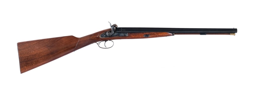 Pedersoli Coach Gun S651 20Ga BP Shotgun: Pedersoli Coach Gun S651 chambered in 20 gauge black powder with 20" side by side double barrels. Manufactured in Italy. Blued barrels and double triggers. Case colored lock, hammers, and trigger guar