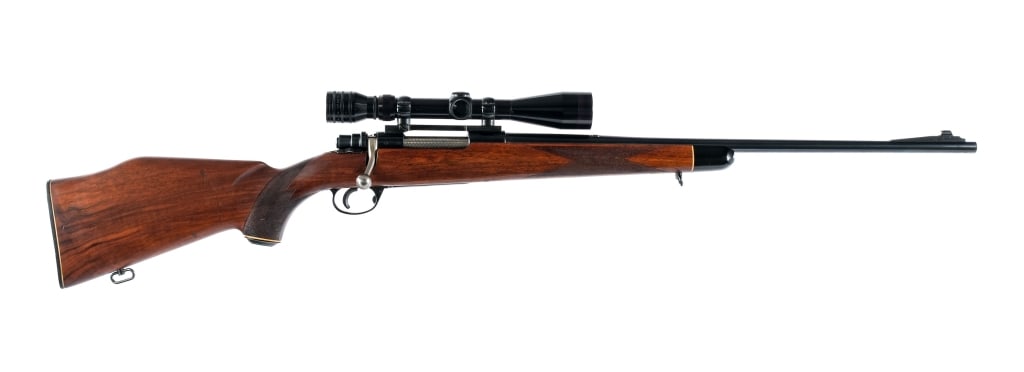 Husqvarna Vapenfabriks 7mm Rem Mag Rifle: Description Husqvarna Vapenfabriks AB in 7mm Remington Magnum with a five round capacity and a 24" barrel. Checkered Monte Carlo style wood stock. Blued trigger, receiver and barrel. Rear right side o