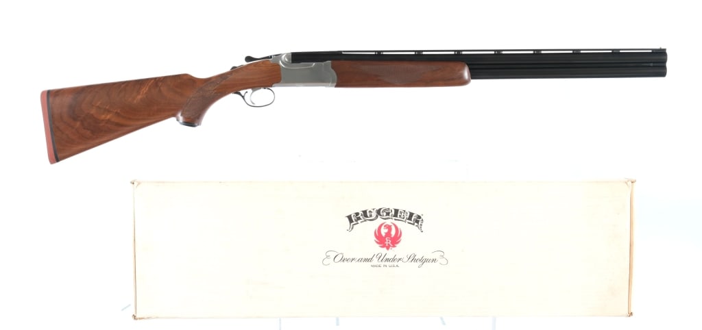 Ruger Red Label 12Ga Over/Under Shotgun: Description Ruger Red Label chambered in 12 gauge for 3" shells with 26" vented rib over/under barrels. Manufactured in 1990 with serial number 410-46944. Top and bottom unmarked removable chokes, mea