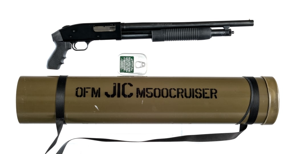 Mossberg JIC 500 Cruiser 12 Ga Pump Shotgun: Description Mossberg JIC ( Just In Case ) 500 Cruiser Kit in 12 gauge 2 3/4"-3" with a six round capacity and a 18.5" barrel. Checkered composite pistol grip. Black finished alloy receiver. Blued barr