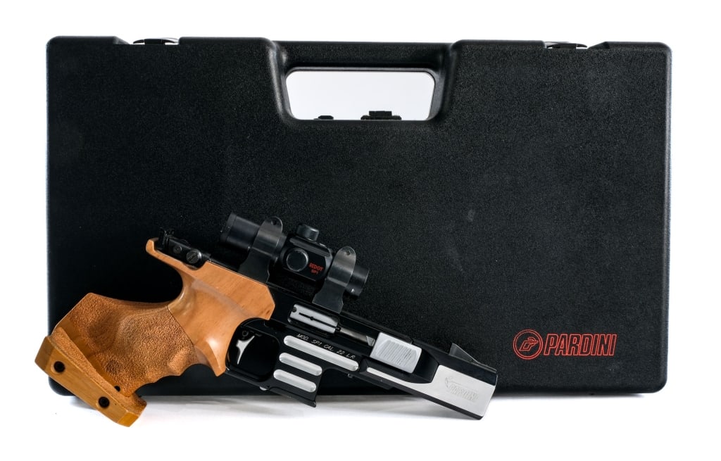 Pardini SP1 Electronic .22 LR Semi Auto Pistol: Description Pardini SP1 Electronic chambered in .22 Long Rifle with one, five round magazine and a 5" barrel. Manufactured in Italy. Front counterweight safety. Ambidextrous charging handle. Top rail