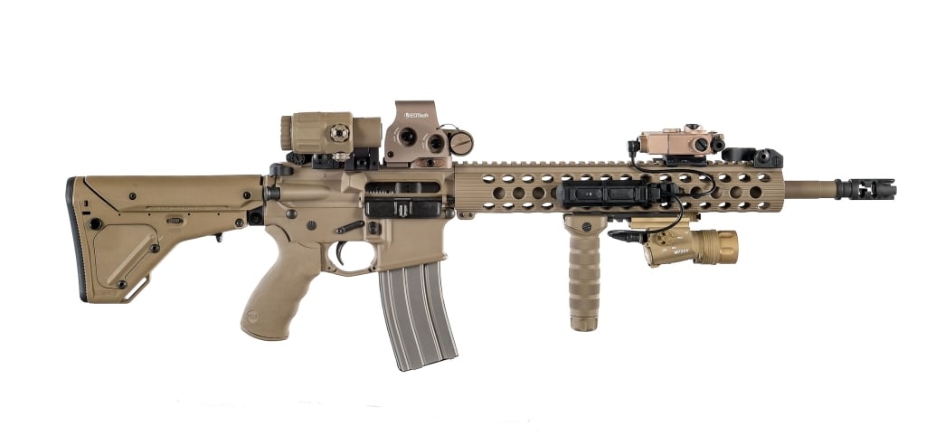 SGW Olympic Arms CAR-AR 5.56 NATO Semi Auto Rifle: Description SGW Olympic Arms CAR-AR chambered in 5.56x45mm NATO with one, thirty round magazine and a 16" 1/9 twist barrel with muzzle break. 13" free float handguard with short picatinny rail section