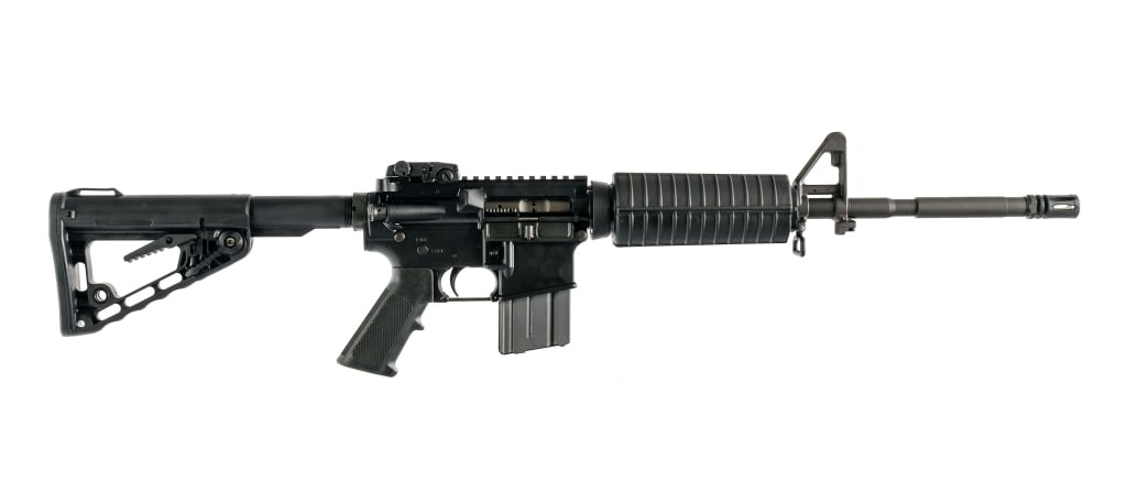 Colt M4 Carbine 5.56 Semi Auto Rifle: Description Colt M4 Carbine in 5.56mm with one, twenty round Colt removable magazine and a 18" 1/7 twist barrel with a A2 style birdcage flash hider. A2 style front gas block with adjustable front sig