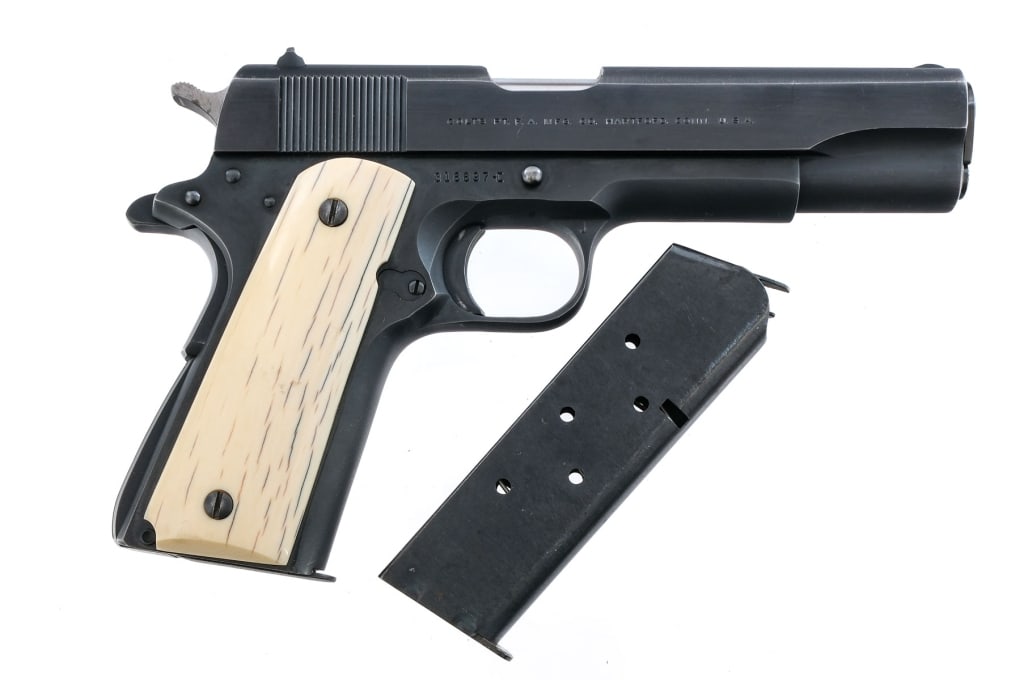 Custom Colt Gov't Model .45 ACP Semi Auto Pistol: Description Colt Government Model 1911 in .45 ACP with two, seven round removable magazines and a 5" barrel. Made in Hartford Connecticut in 1968. Custom Mammoth Ivori Bark grip plates. Blued frame, s